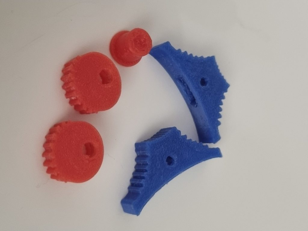 A group of blue and red gears